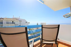 Ef1_Two_sunloungers_on_the_balcony_with_sea_views_available_for_guests.JPG