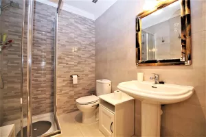 PA2_Family_bathroom_with_shower,_WC_and_hand_basin.JPG