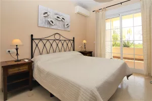 PA2_Master_bedroom_with_king_size_bed_and_air_conditioning.JPG