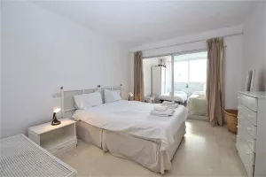 PPBA_Master_bedroom_with_king_size_bed,_two_single_beds_and_air_conditioning.jpg