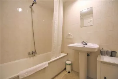 MB7_Ensuite_bathroom_to_the_second_bedroom_with_bathtub_and_over_head_shower.JPG