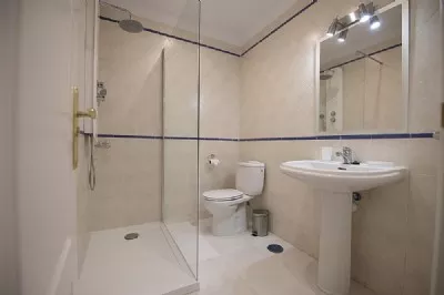PA6J._Family_shower_room_with_spacious_walk_in_shower_.JPG