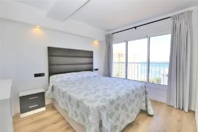 KA1._First_bedroom_has_a_king-size_bed_and_stunning_sea_views.JPG
